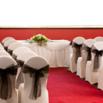 The Ambassador Suite at Mercure Ayr Hotel, set up for a wedding ceremony, red carpet aisle