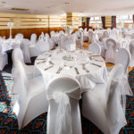 The Windows on the Ocean Room at the Mercure Ayr Hotel set up for a wedding breakfast