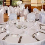 The Windows on the Ocean Room at the Mercure Ayr Hotel set up for a wedding breakfast